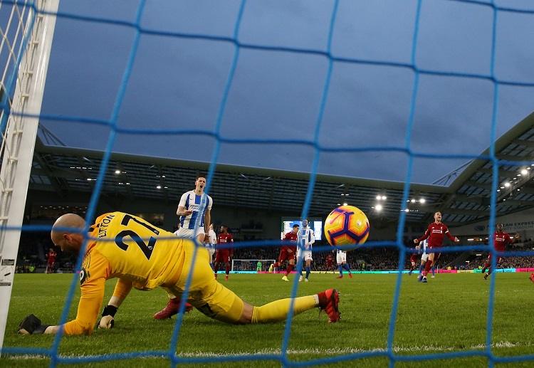 Brighton's David Button vs Mo Salah during their Premier League clash