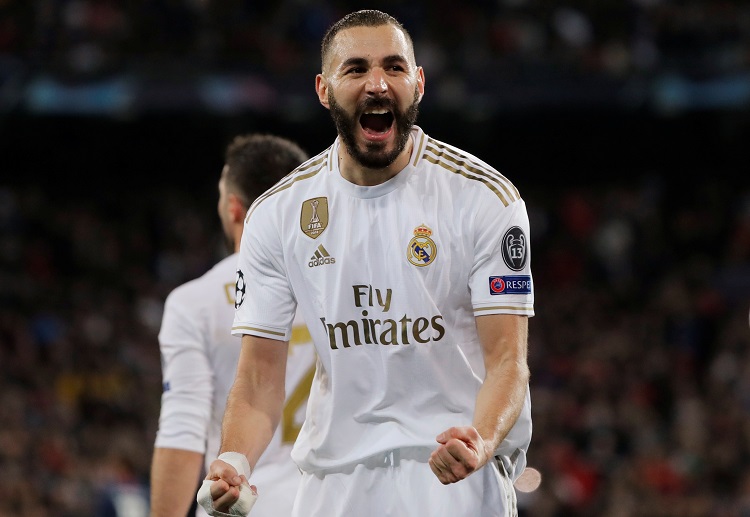 During a Champions League clash with PSG, Real Madrid's Karim Benzema scores Real Madrid's second goal in the 79th minute