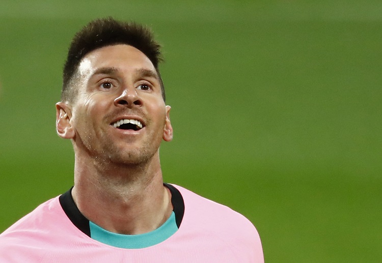 Lionel Messi celebrates as Barcelona claimed a La Liga win against Real Valladolid