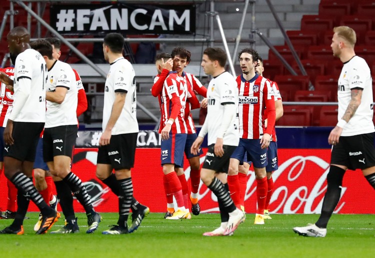 Atletico Madrid makin mantab memimpin klasemen usai menang 3-1 atas Valencia.