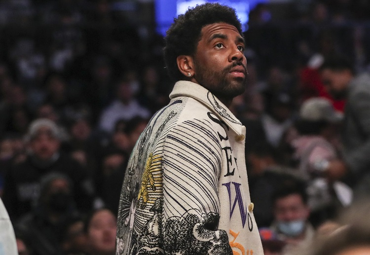 Brooklyn Nets guard Kyrie Irving eyeing his teammates during the NBA match